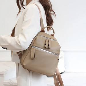 Fashionable khaki PU leather backpack for women with textured finish and side pockets