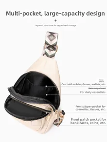 Vue de dessus montrant les multiples compartiments et la grande capacité du sac beige