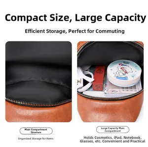 Detail view of the brown textured leather backpack showing large internal storage capacity