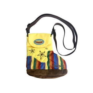 Winter wool crossbody bag in a unique cowboy boot design with colorful rainbow stripes