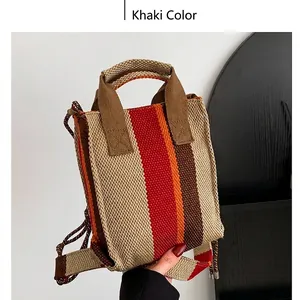 Winter striped fabric handbag in khaki and red with dual straps and woven texture