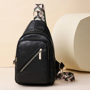 Chic black PU leather crossbody bag with decorative geometric patterned wide shoulder strap