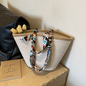 Chic woven tote bag in cream white with khaki trim, decorative silk scarf and wood beads