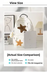 Detailed size comparison of white canvas backpack with star patches next to a tablet device