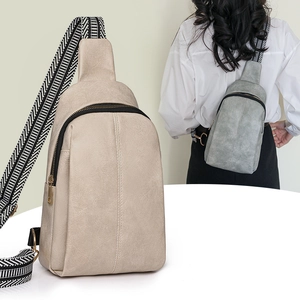 Minimalist textured PU leather chest bag with chic striped wide strap for women