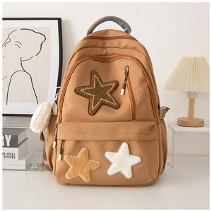 Minimalist khaki canvas backpack featuring 2023 winter fashion star patch design for women