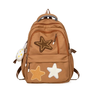 Brown canvas student backpack with colorful star patches and cute plush pendant