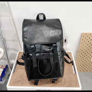 Sac à dos minimaliste en cuir PU noir avec fermeture à boucle et texture de litchi élégante