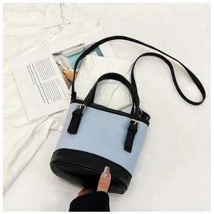 Fashionable light blue PU leather bucket crossbody bag with black handle and shoulder strap