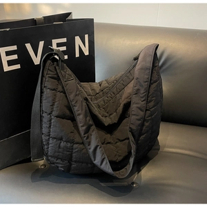 Fashionable black quilted nylon hobo crossbody bag with thick padded strap for women