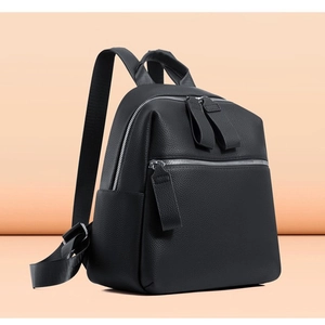 Chic black lychee grain PU leather backpack with silver zippers for professional women
