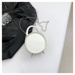 Minimalist white round PU leather handbag with metallic spikes and silver bead chain strap