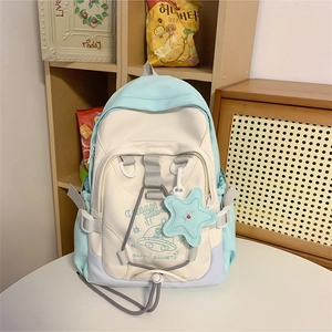 Chic 2024 nylon backpack in blue and white with cartoon astronaut prints and star charm