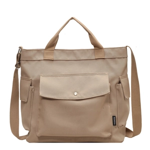 Fashionable khaki canvas tote bag with large capacity and adjustable shoulder strap