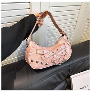 Pink crescent shoulder bag in PU crackle leather with silver studs and chain detail