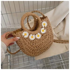 Beige woven straw handbag with 3D white daisy flowers and dual top handles