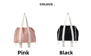 Detail view of pink and black casual drawstring tote bags with white shoulder straps