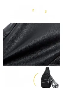 Detail of black lychee grain PU leather sling bag with geometric woven wide strap