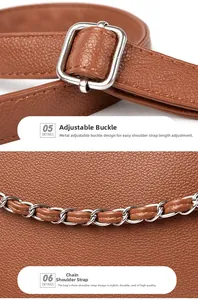 Detailed macro view of adjustable metal buckle and woven chain strap on brown leather handbag