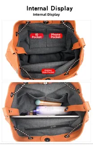 Vue détaillée de l'intérieur du sac orange montrant les poches et le grand espace