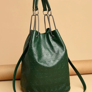 Sac seau chic vert foncé avec cuir embossé tête de mort et poignée chaîne