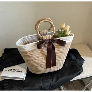 Fashion woven handbag with beige rope material and brown silk bow for spring 2024 fashion