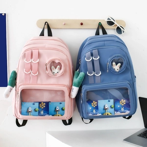 Minimalist nylon backpack with transparent window and astronaut theme in pink and blue