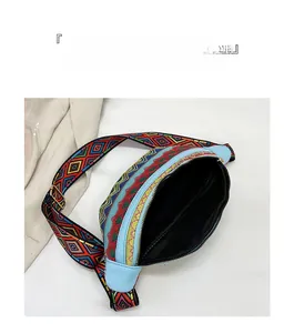 Internal view of ethnic style chest bag with spacious double compartments and blue fabric