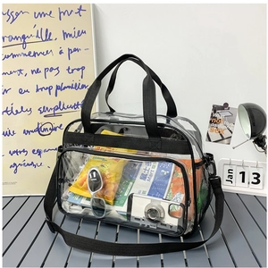Sac cabas transparent en PVC avec bordure noire, bandoulière et vue de rangement