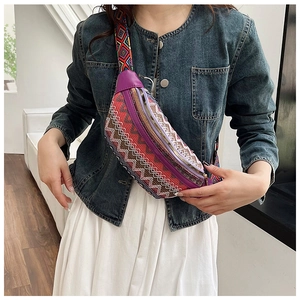 Bohemian purple leather chest bag with ethnic embroidery and wide geometric strap