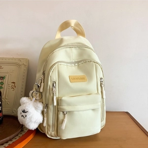 Minimalist cream yellow PU leather mini backpack with zippers and cute bear charm