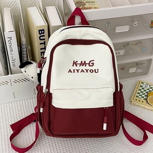 Fashionable red and white polyester backpack with panda charm and letter print detail
