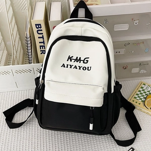 Stylish black and white polyester backpack with contrast lettering and functional pockets