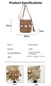 Detailed size and specs of handmade straw bag with floral pattern and tassels