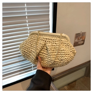 Fashionable beige woven straw clutch bag with gold chain strap for women spring summer