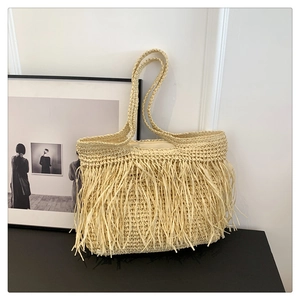 Borsa tote in paglia beige con lunghe frange bohémien per le vacanze estive