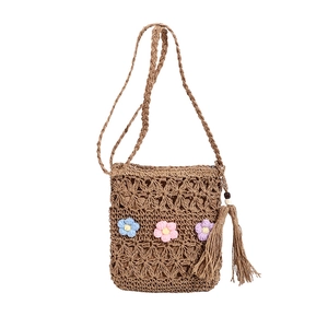 Handmade woven straw crossbody bag with colorful crochet flowers and fringe tassels