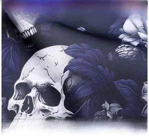 Detailed close-up showing the premium skull and floral printed twill fabric texture
