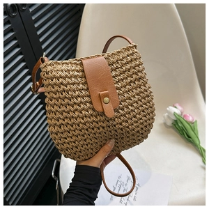Fashionable woven crossbody bag with brown leather flap and magnetic closure for women