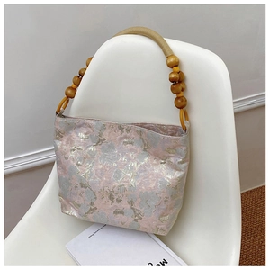 Modische rosa Handtasche aus Seidenjacquard mit Holzperlengriffen und Silberblumenmuster