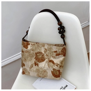 Vintage-Handtasche aus Seide mit floralem Jacquardmuster und dekorativen Holzperlen-Griffen