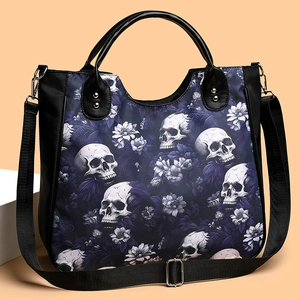 Gothic skull and flower print tote bag in black canvas with adjustable shoulder strap