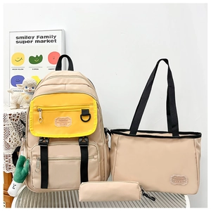 Ensemble de trois sacs à dos d'école en nylon beige avec poche jaune et fourre-tout