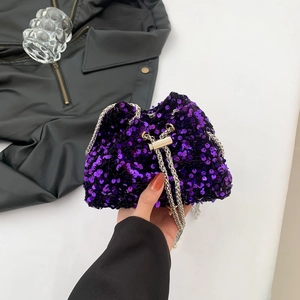 Sparkly purple sequin mini bucket bag with silver chain strap for evening parties