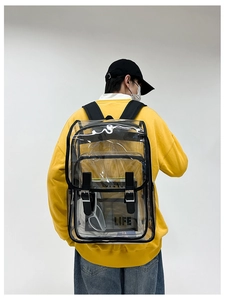 Rear view of a yellow hoodie model wearing a transparent PVC backpack with black trim