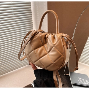 Chic quilted khaki PU leather bucket bag with retro drawstring and gold chain strap