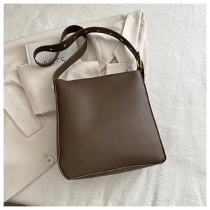 Minimalist dark brown PU leather crossbody tote bag with wide adjustable shoulder strap