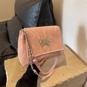 Sac fourre-tout élégant en cuir PU rose clair avec fermoir papillon argenté et bandoulière