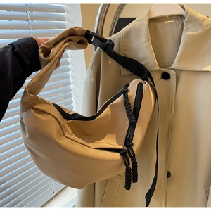 Minimalist beige nylon crescent crossbody bag with adjustable strap for spring fashion