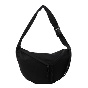 Minimalist black crescent crossbody bag in durable nylon with dual zipper compartments